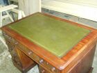 antique leather topped desk after I had replaced leather and brought the sunbleached top back to life